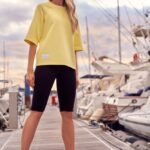 Schwarze knielange Leggings