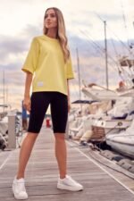 Schwarze knielange Leggings