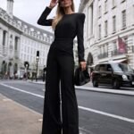 Schwarzer taillierter Overall mit Schulterpolstern