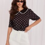 Schwarze Bluse mit weißen Punkten